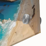 Close-up of a vibrant acrylic glass wall art piece showcasing a serene beach landscape, featuring soft waves and golden sands, perfect for coastal-themed decor.