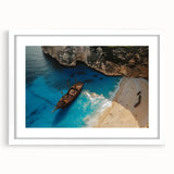 Framed wall art from the Landscapes Beaches Design collection, featuring a serene beach scene with vibrant colors, displayed in a sleek white frame with a mat.