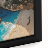 Framed canvas wall art featuring a vibrant beach landscape design with soft waves and a bright sunset, perfect for coastal-themed decor and relaxation.