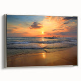 Framed canvas wall art showcasing a serene beach landscape, featuring vibrant colors and a silver frame, perfect for enhancing modern home decor.