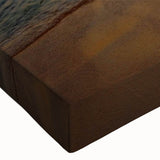 Close-up image of a stretched canvas wall art piece depicting a serene beach landscape, featuring soft pastel colors and gentle waves, ideal for home decor.