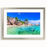 Framed wall art collection showcasing serene beach landscapes in silver frames with mats, ideal for enhancing home decor and coastal-themed interiors.