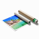 Rolled print showcasing a serene beach landscape with vivid blues and golden sands, perfect for home decor, elegantly packaged for easy display and protection.