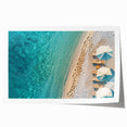 Rolled wall art print showcasing a serene beach landscape with vibrant blues and sandy tones, ideal for home decor, rolled in protective packaging for delivery.