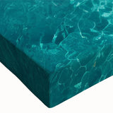 Close-up of a stretched canvas wall art piece showcasing a serene beach landscape, featuring vibrant colors and intricate details, perfect for home decor.