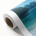 Vibrant rolled canvas artwork showcasing a serene beach landscape with vivid colors, perfect for home decor, packaged securely in a durable tube.