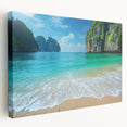 Stretched canvas wall art showcasing a vibrant beach landscape design, featuring soft waves and sandy shores in soothing blue and beige tones, ideal for home decor.