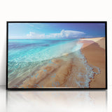 Framed acrylic wall art showcasing a serene beach landscape with vibrant colors, elegant black frame, ideal for enhancing home decor. Perfect for coastal-themed interiors.