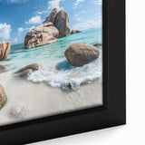 Close-up of a framed canvas wall art piece showcasing a vibrant beach landscape design, featuring calming blue ocean waves and golden sand under a bright sky, perfect for home decor.