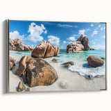 Framed canvas wall art featuring a serene beach landscape with soft pastel colors, silver frame, and elegant side view, perfect for home decor.