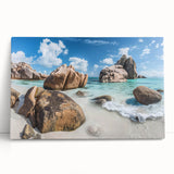 Stretched canvas wall art showcasing a vibrant beach landscape design with soft pastel colors, leaning against a neutral wall, perfect for coastal decor.