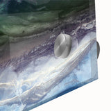 Close-up of a vibrant acrylic glass wall art piece showcasing a serene beach landscape, featuring soft waves and a pastel sky, perfect for modern home decor.