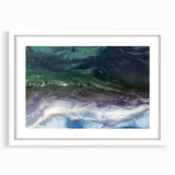Framed wall art collection showcasing a serene beach landscape with soft pastel colors, presented in a white mat and sleek frame, ideal for home decor.