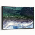Framed canvas wall art depicting a serene beach landscape with vibrant colors and intricate details, showcasing a black frame and side view perspective.