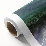 Rolled canvas wall art showcasing a vibrant beach landscape design with blues and yellows, ideal for home decor. Packaged securely in a cardboard tube.