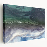 Stretched canvas wall art featuring a vibrant beach landscape design in warm tones, showcasing gentle waves and a serene horizon, perfect for coastal decor.