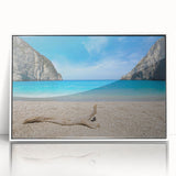 Framed acrylic wall art showcasing a vibrant beach landscape with soft waves and golden sand, set against a bright blue sky, ideal for coastal home decor.