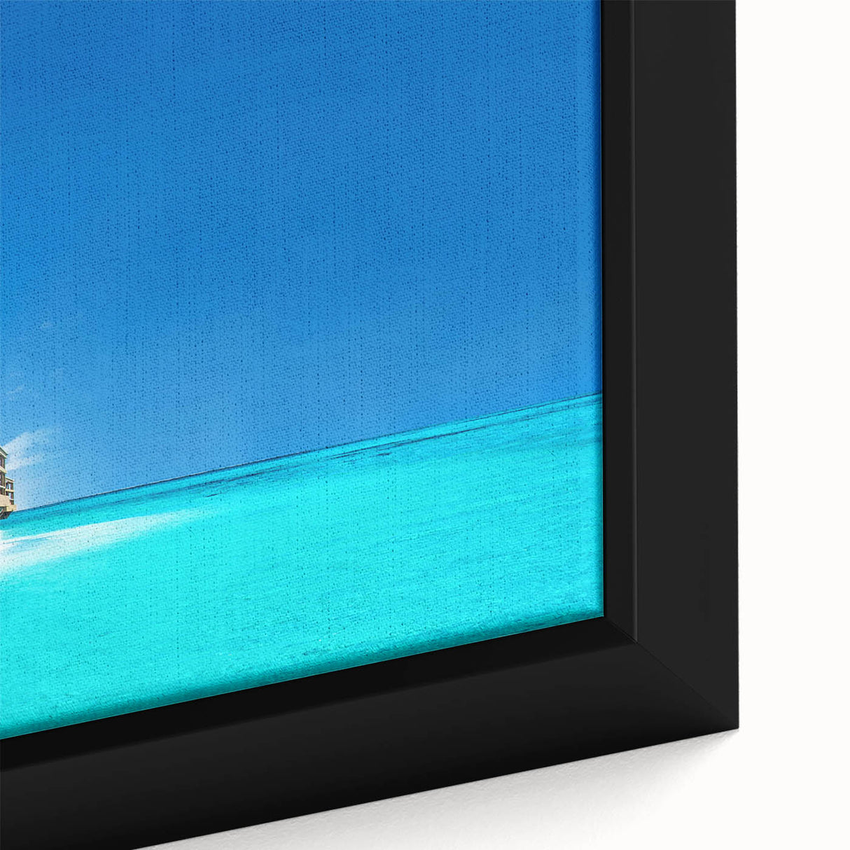Framed canvas artwork showcasing a serene beach landscape with vibrant colors, capturing golden sands and gentle waves, perfect for home decor.