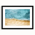 Framed black wall art showcasing a serene beach landscape with vibrant colors and intricate details, ideal for modern home decor. The design complements various interior styles, adding a tranquil ambiance to any space.
