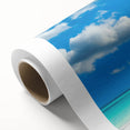 Vibrant rolled canvas print showcasing a serene beach landscape with golden sands and turquoise waves, ideal for enhancing home decor and creating a tranquil ambiance.