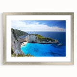 Framed wall art featuring a stunning beach landscape design with a silver mat, ideal for home decor, adding a serene coastal vibe to any room.