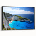 Framed canvas wall art showcasing a serene beach landscape design with vibrant colors, displayed in a sleek black frame, perfect for home decor.