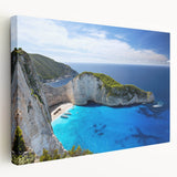 Stretched canvas wall art showcasing a serene beach landscape, featuring vibrant colors of blue and golden sand, ideal for coastal decor in modern homes.