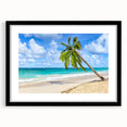 Black-framed wall art collection showcasing a serene beach landscape, featuring soft pastel colors and a mat for an elegant display. Ideal for coastal-themed decor.