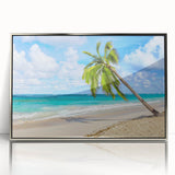 Framed acrylic wall art depicting a vibrant beach landscape with calming blue and sandy tones, showcasing a serene coastal scene, ideal for home decor.