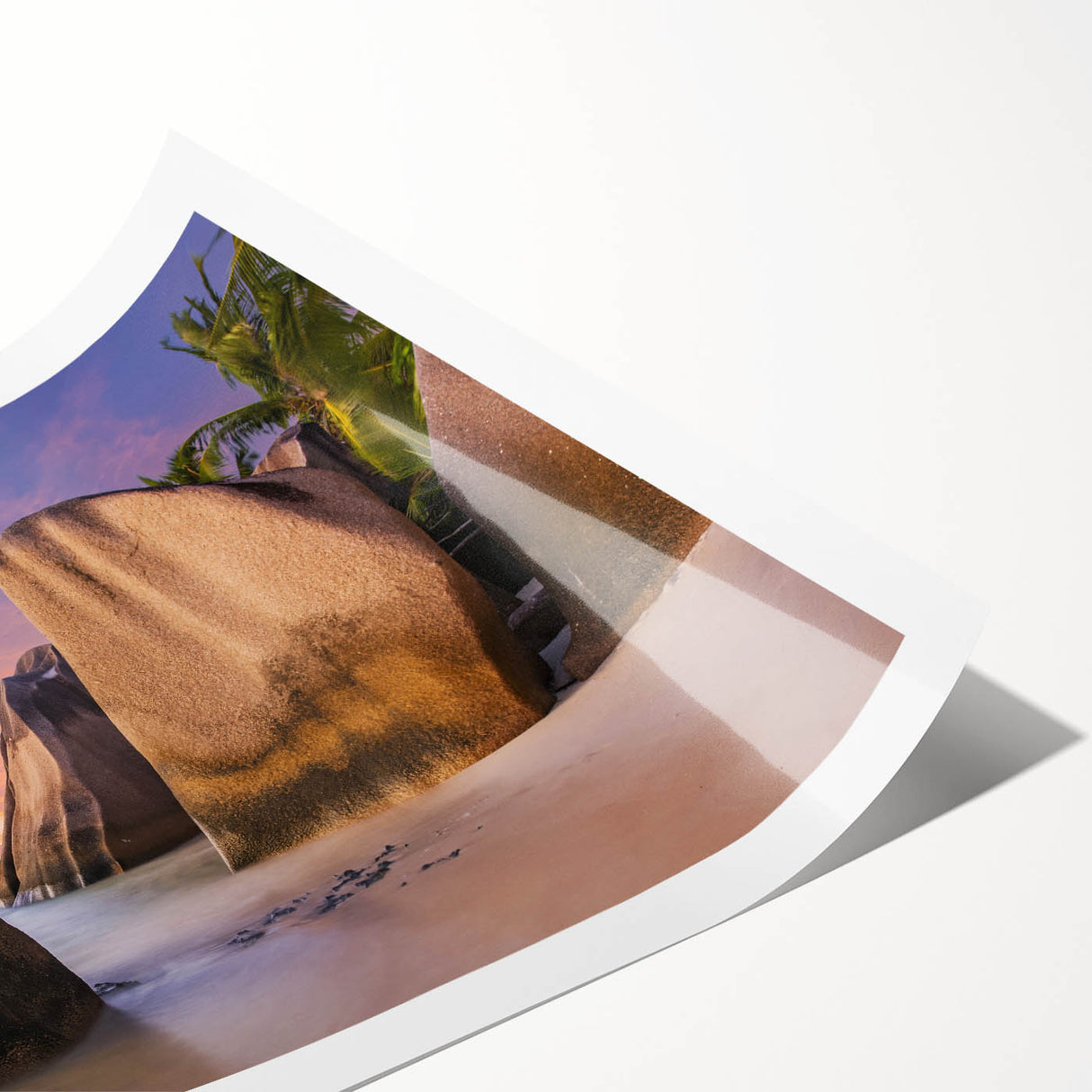 Serene beach landscape wall art print showcasing vibrant blue waters and golden sands, rolled for easy framing and display, ideal for coastal decor enthusiasts.