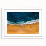 Framed wall art collection showcasing a serene beach landscape with vibrant colors, white matting, and a sleek black frame, ideal for coastal decor enthusiasts.