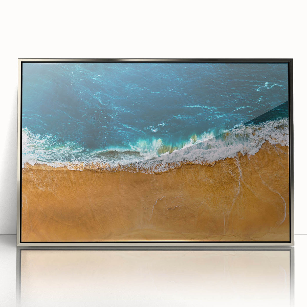 Framed acrylic wall art showcasing an abstract beach landscape with silver accents, perfect for modern home decor. Ideal for adding a serene coastal vibe.