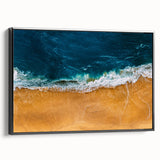 Black-framed canvas wall art depicting a serene beach landscape with vibrant colors and intricate details, showcasing waves and sandy shores, ideal for home decor.