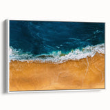 Framed canvas wall art showcasing a serene beach landscape design with vibrant colors, displayed from a side view against a white background, perfect for home decor.