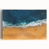 Stretched canvas wall art depicting a vibrant beach landscape with vivid blue skies and golden sands, perfect for adding a serene coastal vibe to any room.