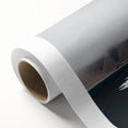 Rolled canvas showcasing a vibrant beach landscape design, featuring vivid blues and sandy tones, ideal for coastal-themed decor and wall art collections.