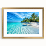Elegant gold-framed wall art featuring a serene beach landscape design, complete with a white mat for added sophistication, perfect for home decor.