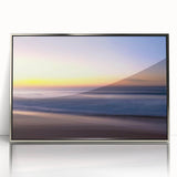 Framed acrylic wall art depicting a serene beach landscape with vibrant colors, set in a sleek silver frame, ideal for modern home decor.