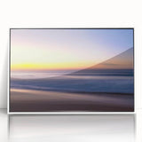 Framed acrylic wall art showcasing a serene beach landscape with vibrant colors and intricate details, set in a sleek white frame, perfect for modern decor.