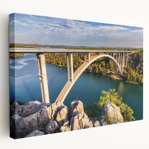 Stretched canvas wall art showcasing a vibrant landscape featuring a bridge, with rich colors and intricate details, perfect for home decor. Ideal for nature lovers and art enthusiasts.