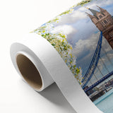 Rolled canvas artwork showcasing a vibrant landscape bridge design, featuring rich colors and intricate details, perfect for modern home decor. Packaged securely in a cardboard tube.