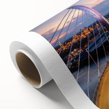 Rolled canvas wall art featuring a vibrant landscape scene with a modern bridge, showcasing vivid colors and intricate details, perfect for home decor.