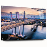 Acrylic glass wall art featuring a modern landscape design of a bridge, displayed in a side view with decorative pins. The vibrant colors and sleek finish enhance any contemporary decor.