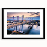 Framed black wall art featuring a serene landscape bridge design, elegantly matted for a polished finish, perfect for enhancing home decor aesthetics.