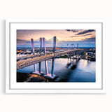 Framed wall art featuring a serene landscape bridge design, showcased in a stylish white frame with a mat, ideal for enhancing home decor aesthetics.