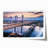 Vibrant rolled print showcasing a serene landscape bridge design, featuring lush greenery and a tranquil waterway, perfect for enhancing home decor.