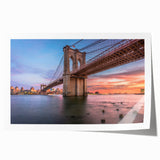Rolled print of a serene landscape featuring a bridge over a tranquil river, designed for wall art decor. Ideal for enhancing home aesthetics with nature-inspired themes.