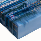 Close-up view of a vibrant stretched canvas showcasing a modern landscape bridge design, highlighting rich colors and intricate details, perfect for contemporary home decor.