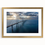 Elegant framed wall art featuring a scenic landscape bridge design, accented with a stylish gold frame and matting, adding a touch of sophistication to any decor.