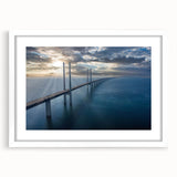 Framed wall art featuring a serene landscape with a bridge, presented with a white mat, enhancing the overall aesthetic for home decor. Perfect for adding tranquility to any room.